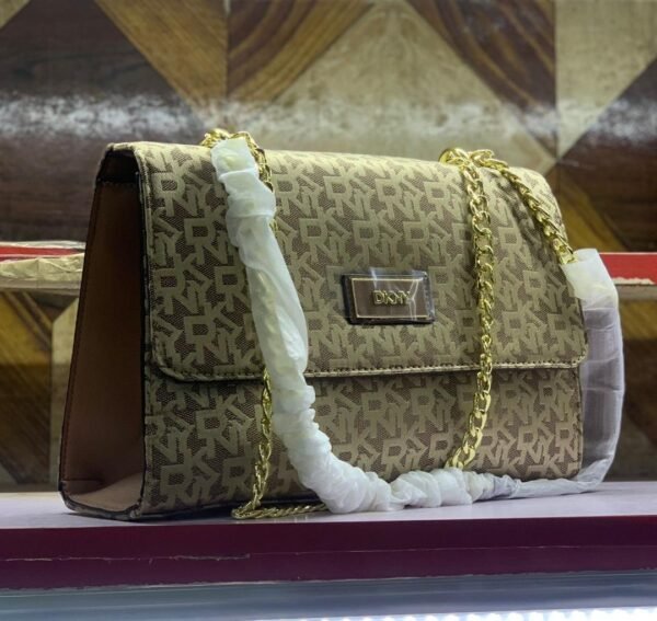 Discover the Elegance of the DKNY Hand Bag - Image 7